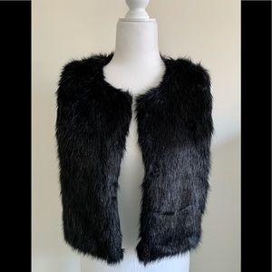 Black faux fur vest